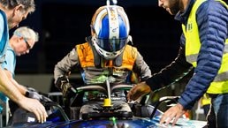 Jake Hughes, Formula E driver, enters his car