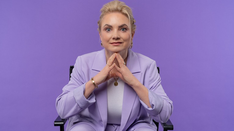 Radka Dohnalová in a purple background