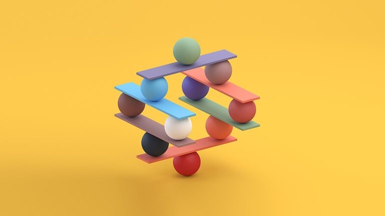 Jenga game color block tower with balls - stock photo