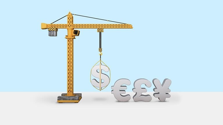 Tower crane with currency symbols