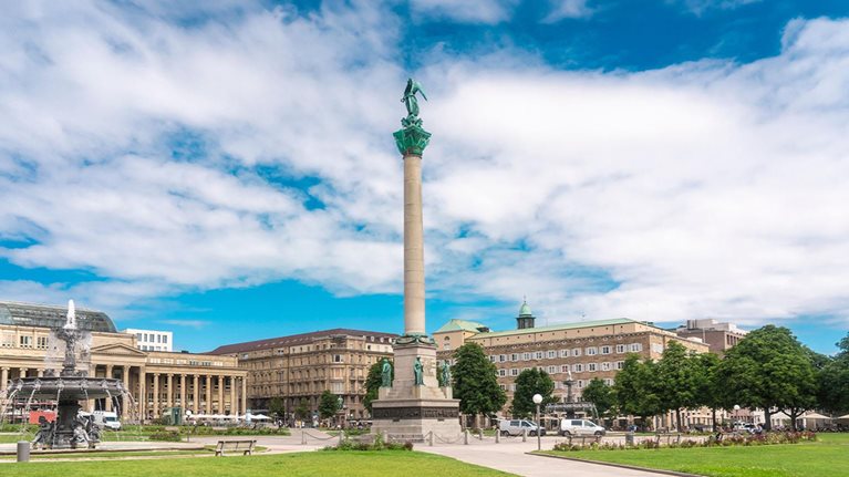 Germany, Baden-Wurttemberg, Stuttgart, Clouds over Schlossplatz with Jubilaumssaule in foreground