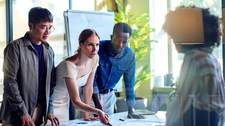 Focused team working collaboratively during a business strategy planning session