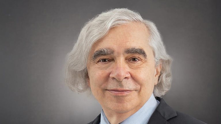 Smiling portrait photo of former US Energy Secretary Ernest Moniz