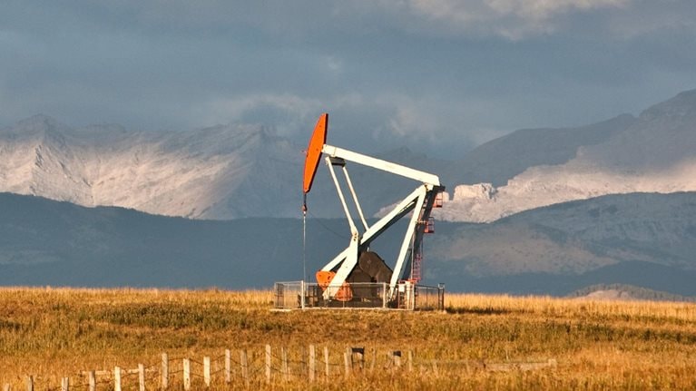 Oil Rig in Alberta in Fall - stock photo