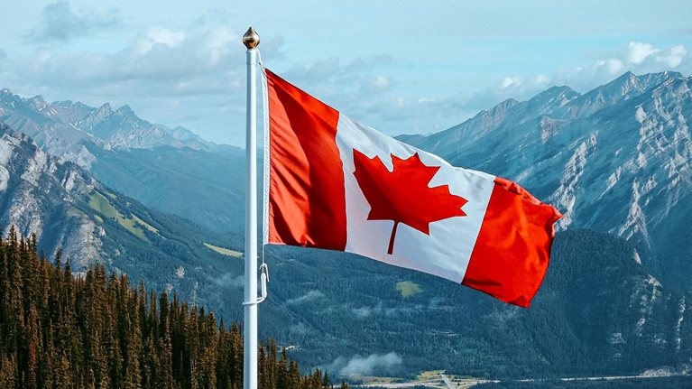 Canadian Flag in the Mountains