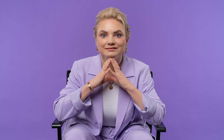Radka Dohnalová in a purple background
