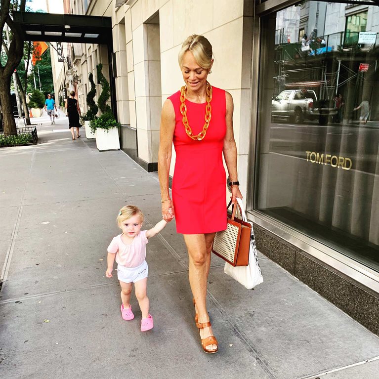 Karin Hehenberger with daughter on city street