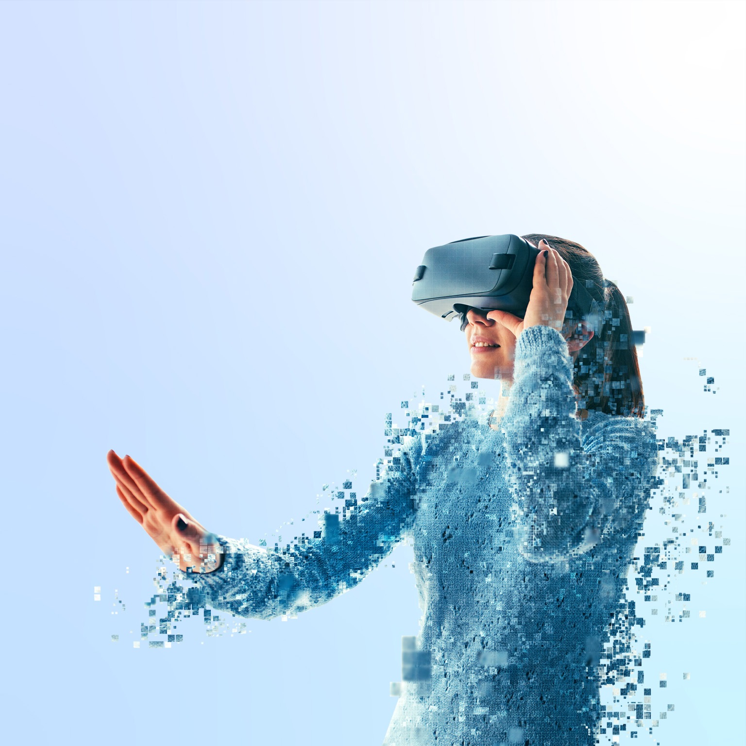 A woman disintegrating while looking into a virtual reality headset