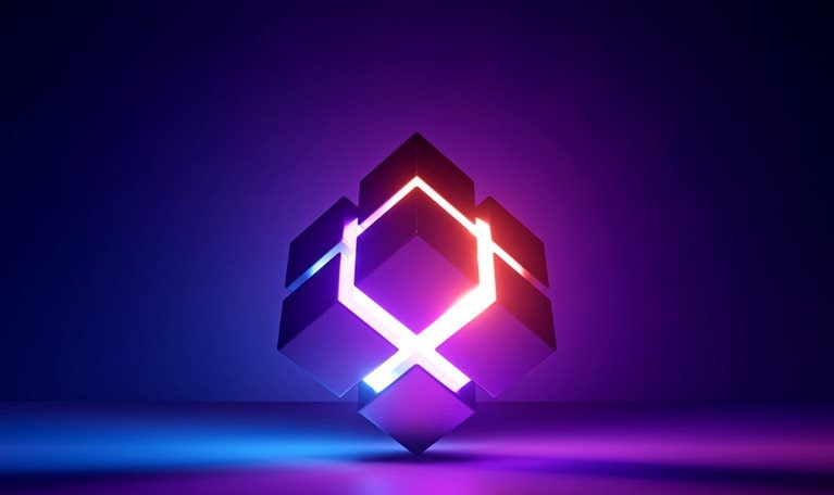 Against a dark blue backdrop, a cube radiates a vibrant blend of purple and orange light from its center. Divided in half crosswise, the center casts an ethereal glow onto the surrounding surface.