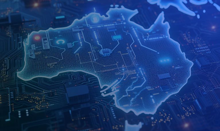 Outline of Australia superimposed over computer chip. - stock image