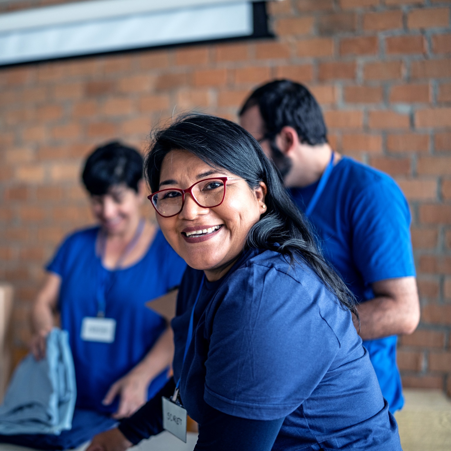 Portrait of a volunteer working in a community charity donation center