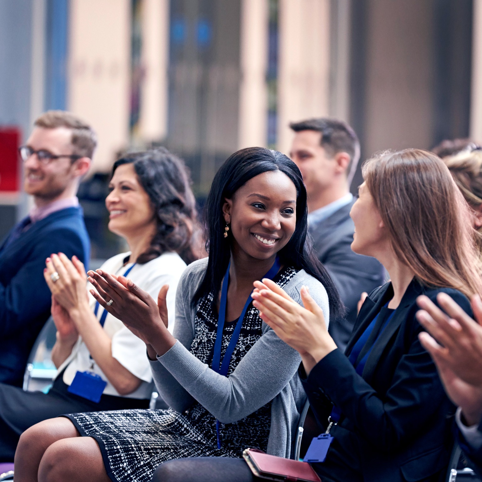 Audience Applauding Speaker After Conference Presentation