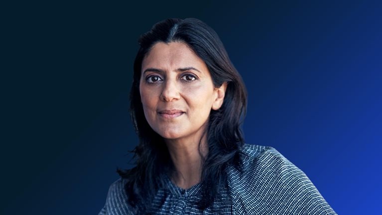 Portrait of a mature businesswoman having a meeting with her team in a modern office