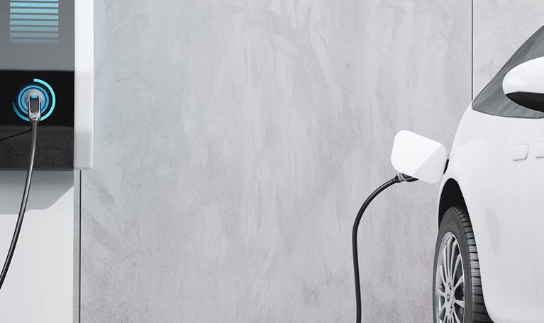 Electric car being charged