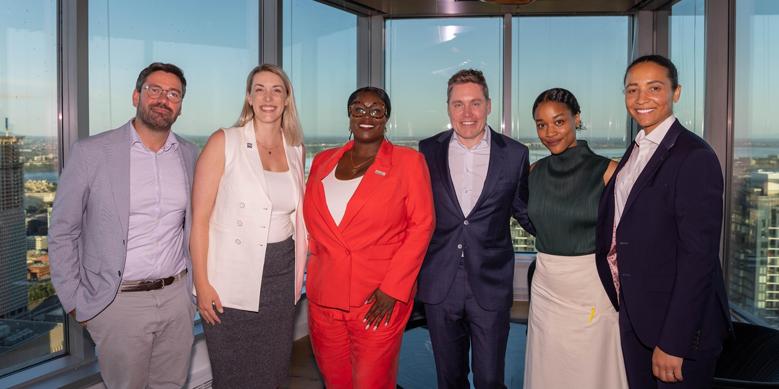 McKinsey & Company and McCarthy Tétrault Fierté event organizers: Norman Carra, Laurie Lanoue, Charlene Theodore, Bryn Gray, Liela Touré, and Ruth Knox