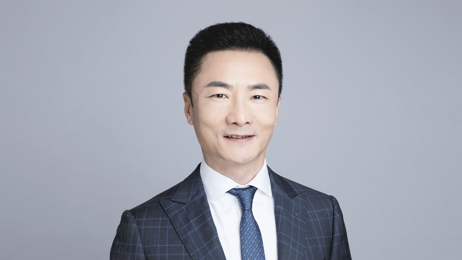 Headshot of Ren Huichuan