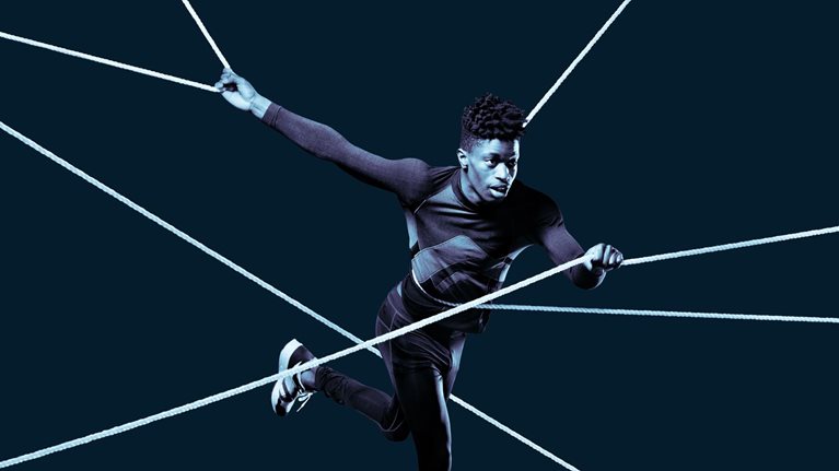 Photo of an athlete navigating a resistance exercise with agility