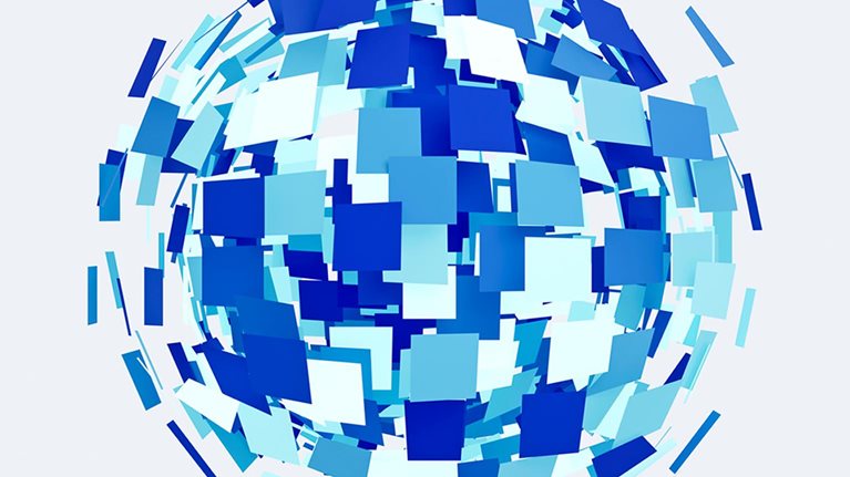 Globe made from squares expanding on white background