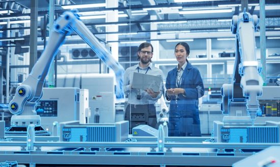 Electronics Factory Digitalization: Automated Robot Arm Assembly Line Manufacturing Advanced Equipment. Managers Discussing Work while Futuristic AI Computer Vision Analyzing, Scanning Production Lin