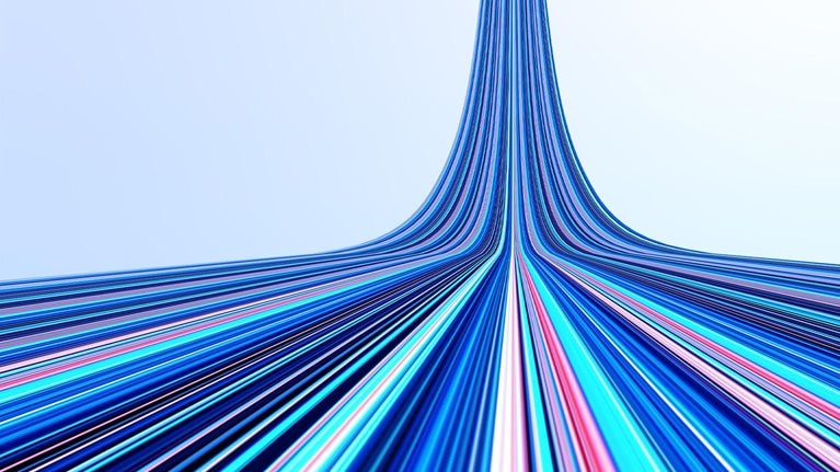 Abstract image of colorful digital lines coming down and spreading forward like a highway.