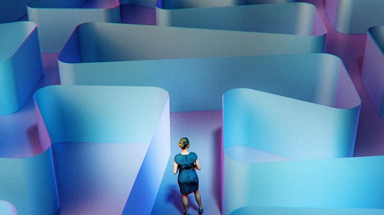 Woman standing in abstract 3d maze.