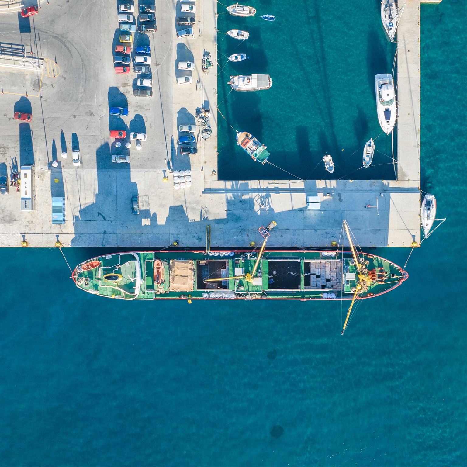 Top down aerial view of a commercial boat at the port - stock photo