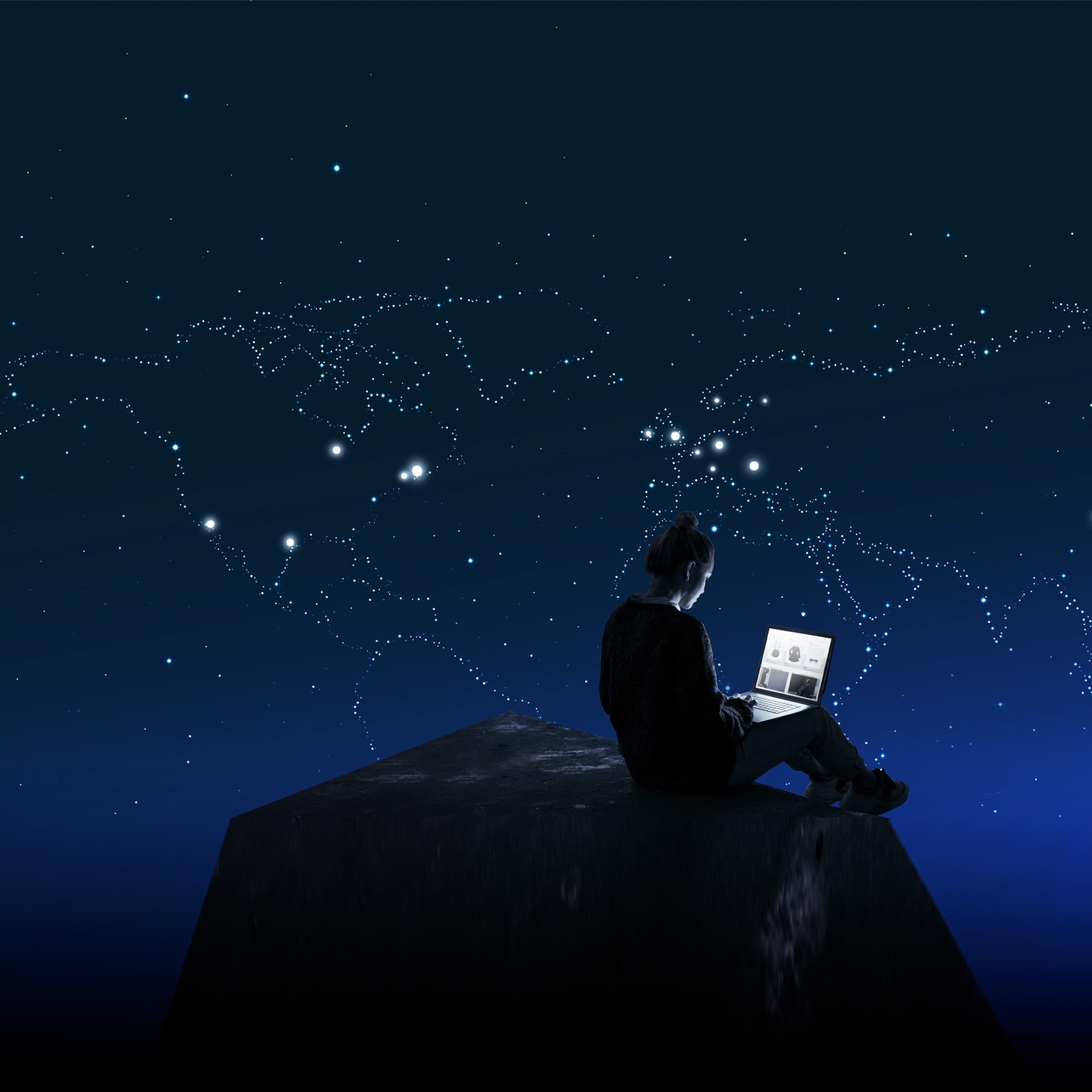 Woman sitting on rock with laptop, night sky making constellation of globe in the stars