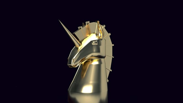 A gold unicorn chess piece