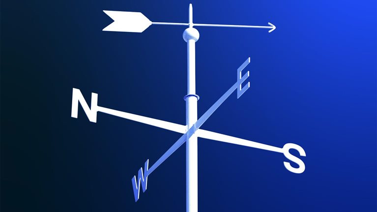 White weathervane on blue gradient background