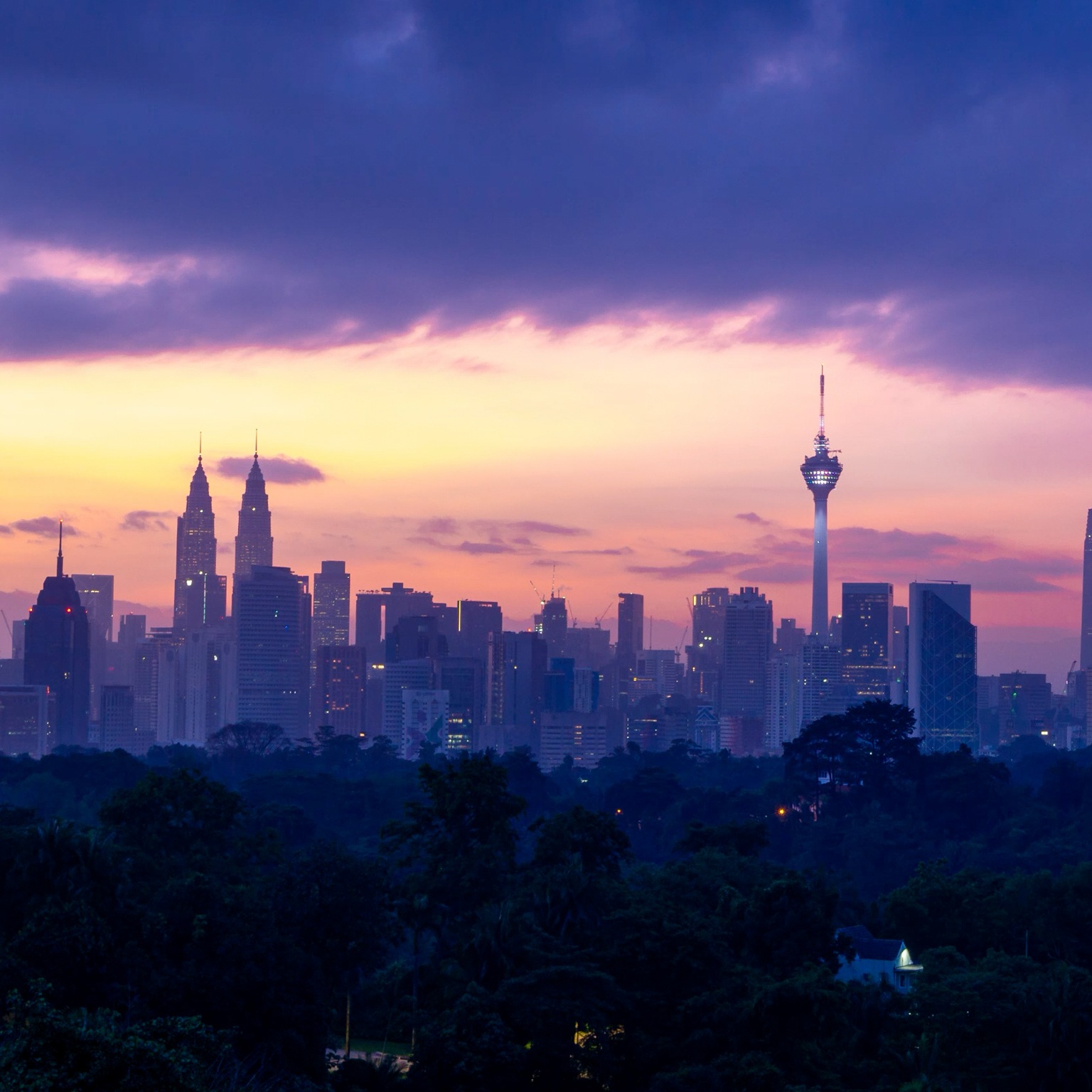 Time lapse of moving clouds over downtown Kuala Lumpur, Malaysia.