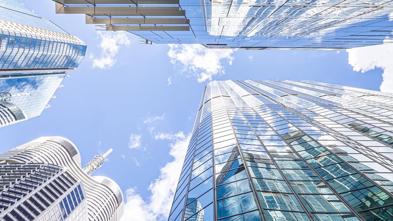 glancing up at skyscraper photo
