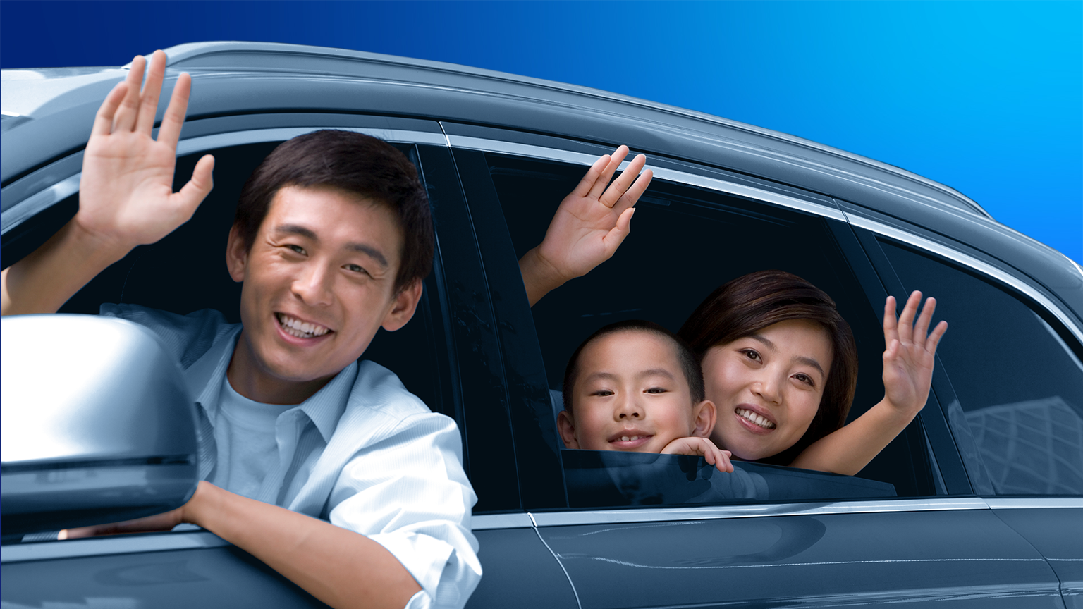 Family waves from their new car