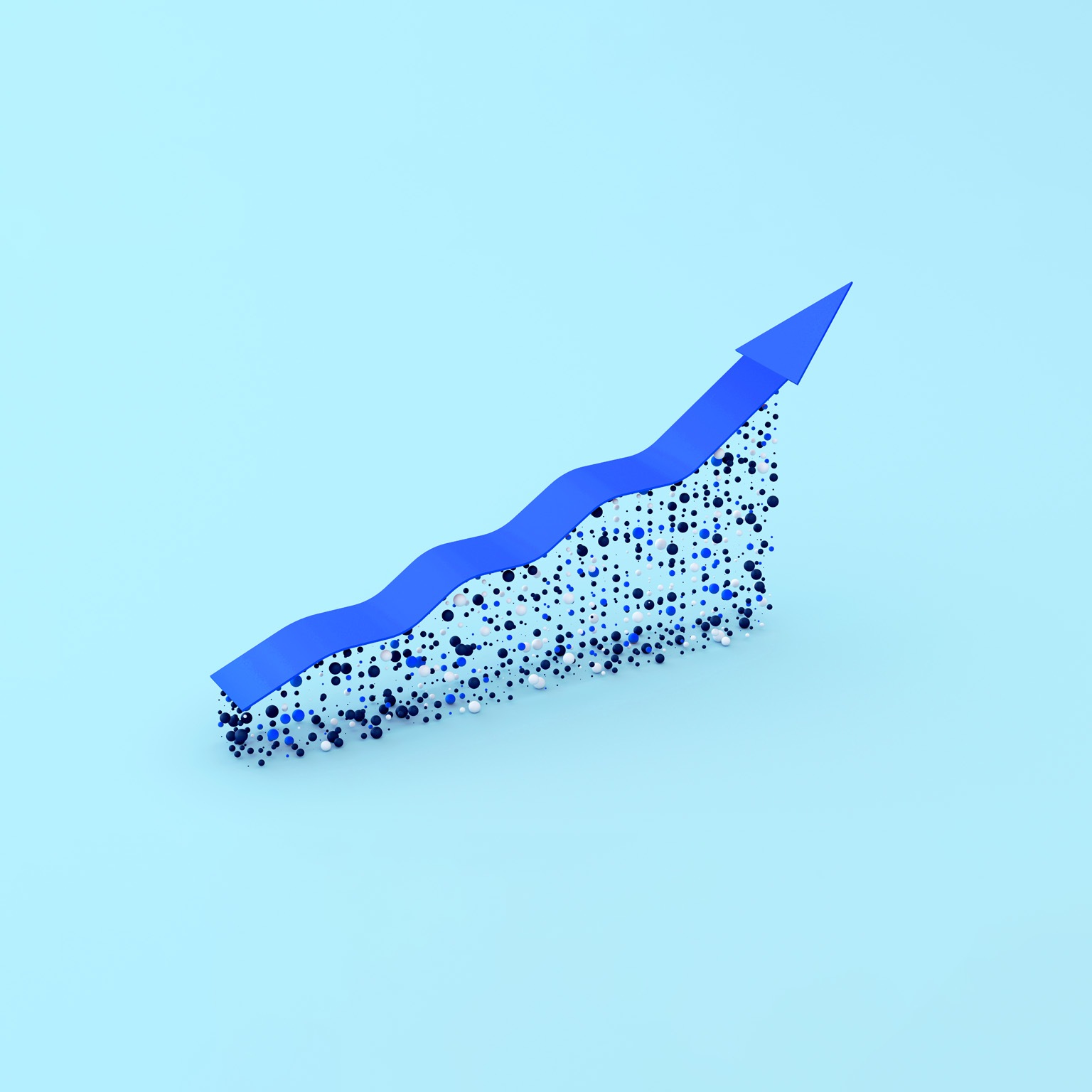 A blue arrow trending upwards symbolizes growth. The arrow appears to be constructed on a foundation of small blue, black, and white spheres, creating a dynamic and textured effect.