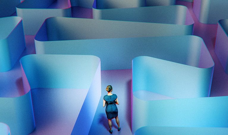 Woman standing in abstract 3d maze.
