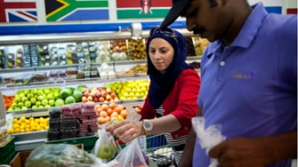 Gulf shoppers trim spending and turn to online retailers to save cash