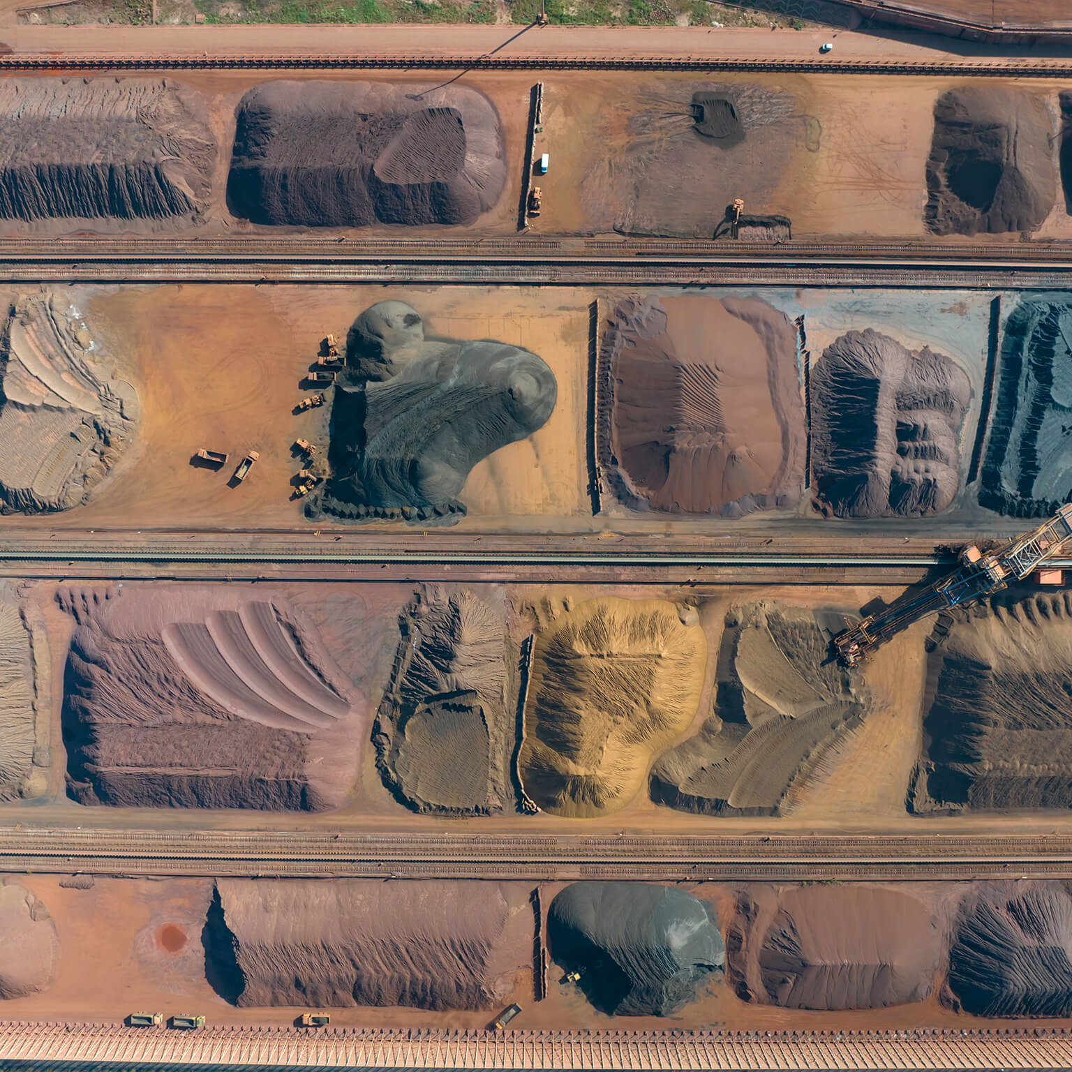 Aerial view of metal raw materials stacked at freight terminal