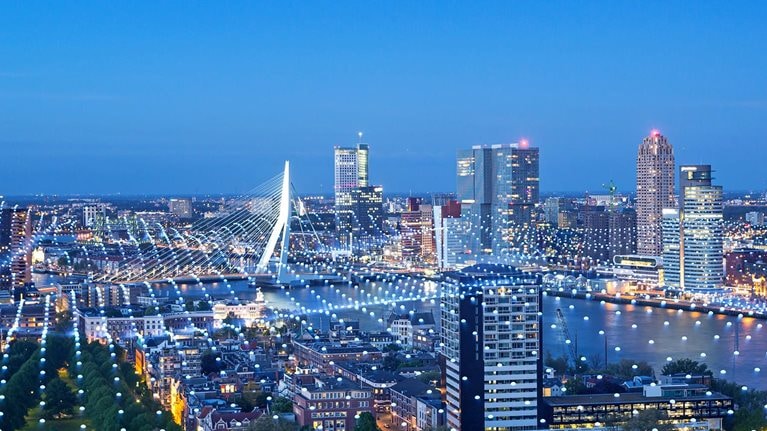 Cityscape with abstract particles covering ground and buildings