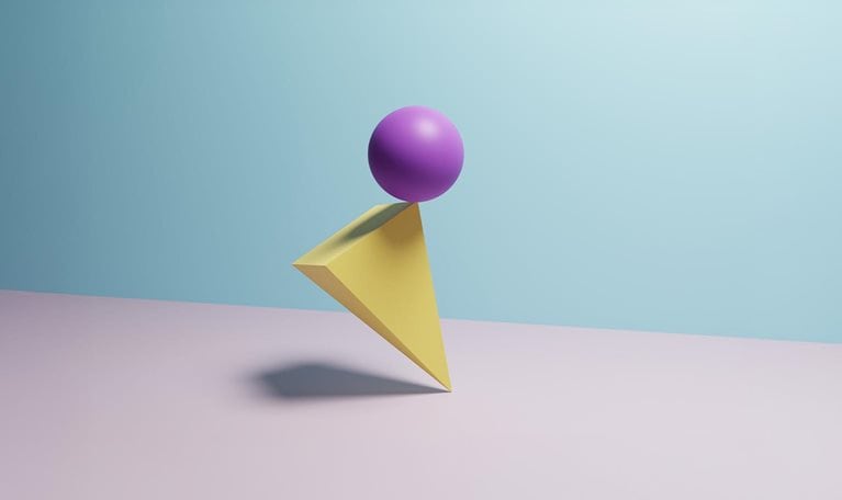 Sphere balanced on a pyramid in an impossible position