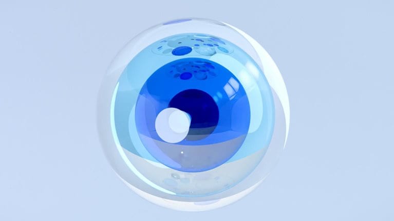 Abstract eye comprising blue and clear glass spheres