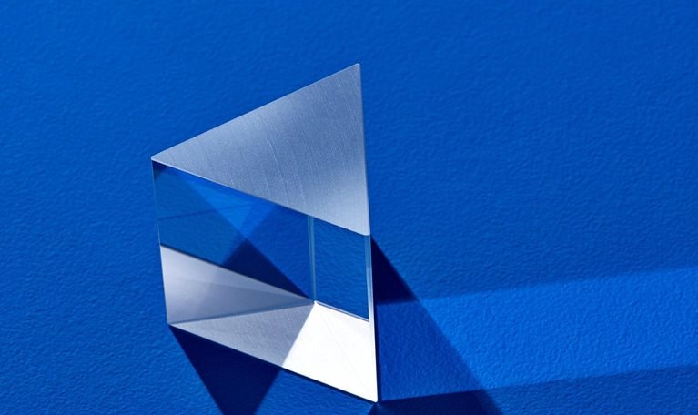 Triangular prism refracting light beam