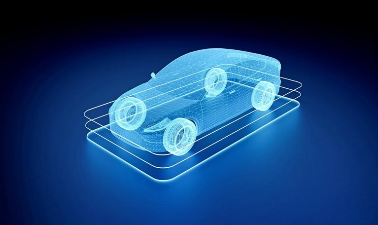 A futuristic wireframe of a vehicle on a charging pad. 
