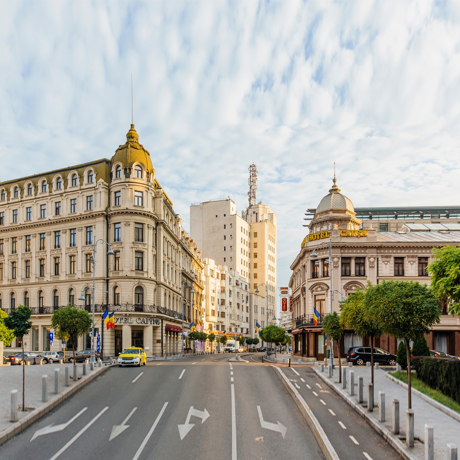 Bucharest street with historic buildings early in the morning, Bucharest, Romania - stock photo