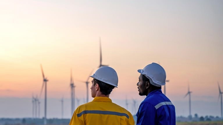 Windmills and Workers - stock photo
