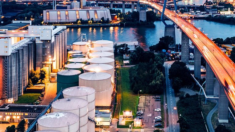 An aerial view of an industrial zone / power station at night