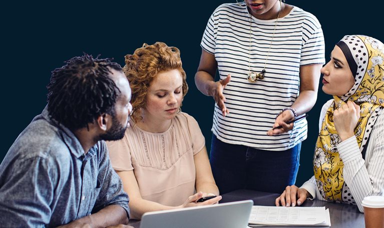 Diverse group of business people having discussion during meeting in office