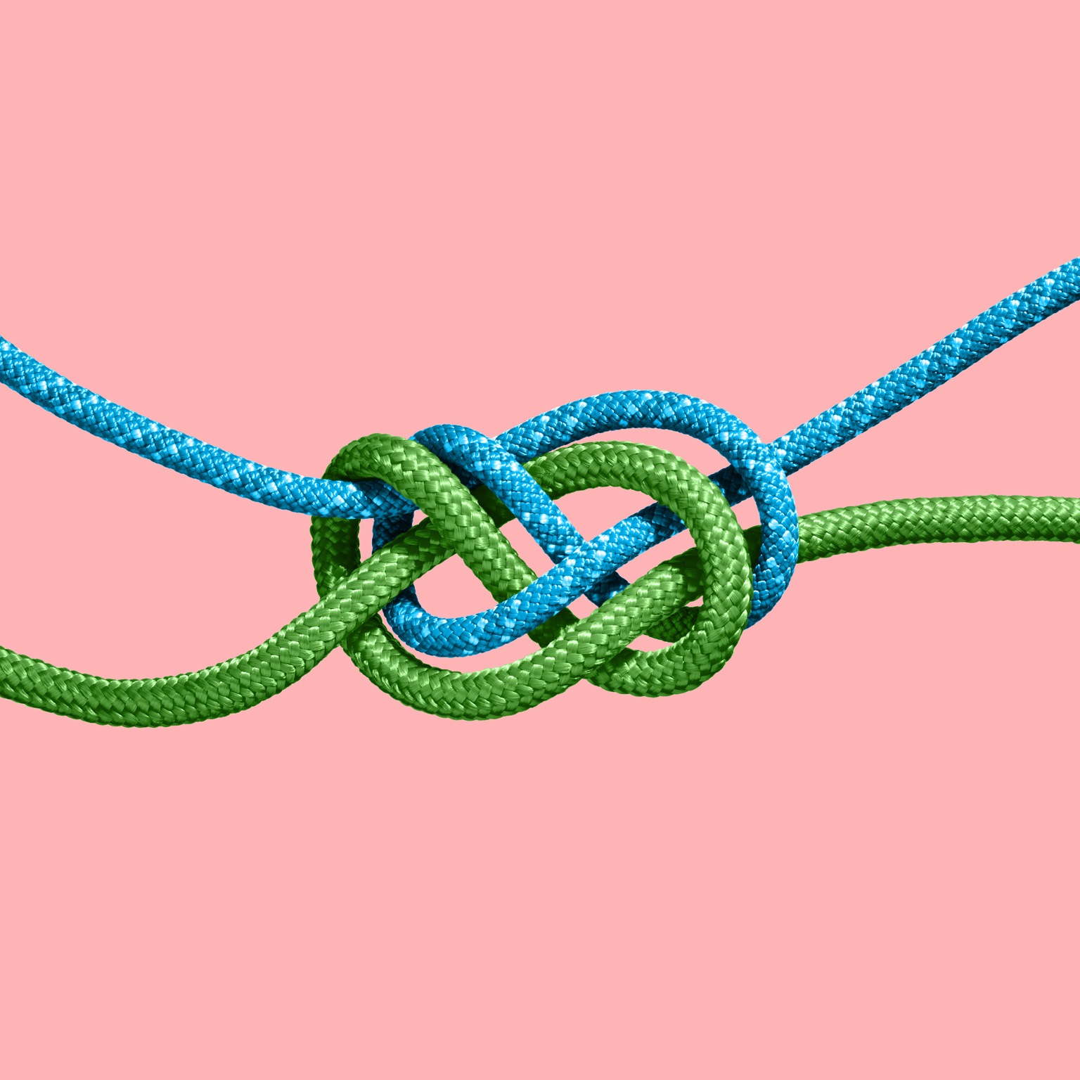Two colored ropes knotted together.