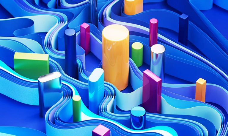 Colorful geometric shapes, primarily cylinders and rectangular prisms in varying heights and shades of vibrant colors. These shapes are nestled within a swirling, layered landscape of undulating blue ribbons, creating a sense of depth and movement.
