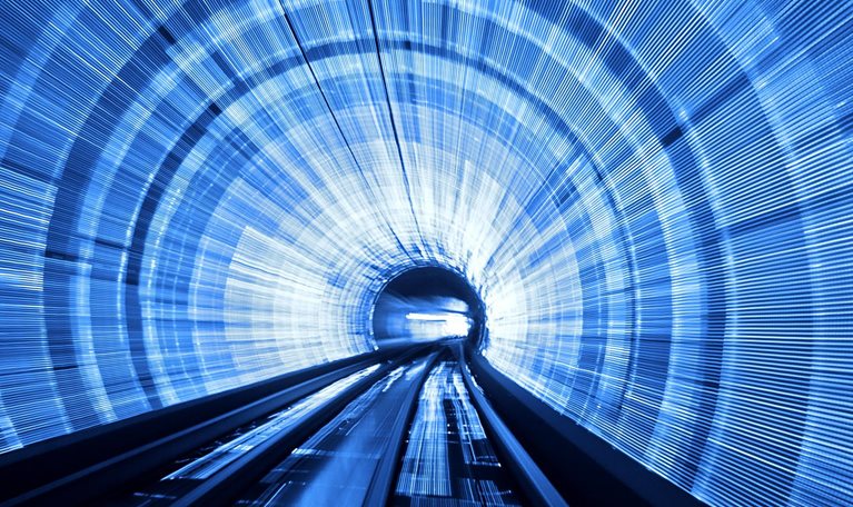 Abstract background light waves in deep tunnel as seen from a train in Shanghai, China