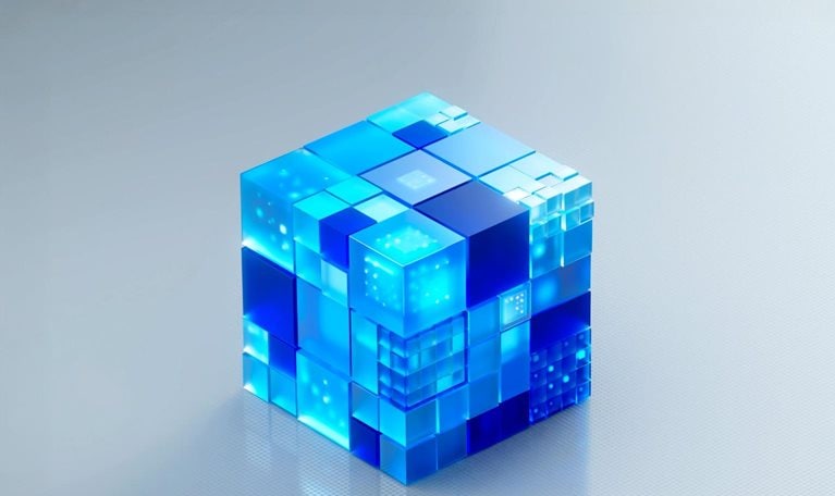 A digitally generated animation of small futuristic, translucent glass cubes coming together to from a larger cube which sits on a clean, light background, giving it a sleek, high-tech and abstract feel.