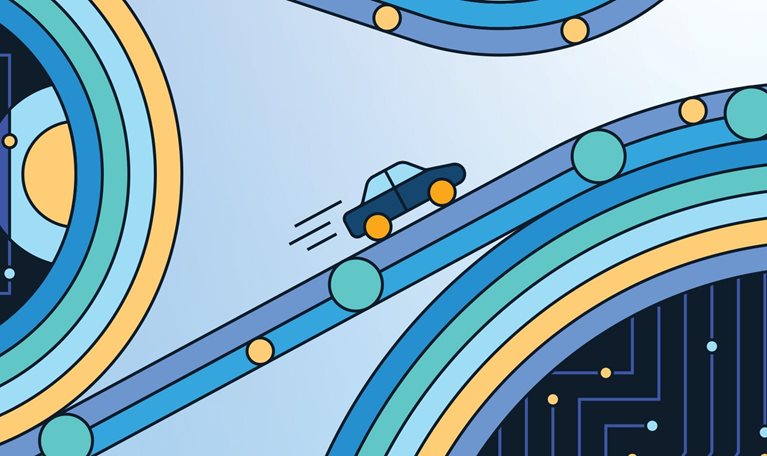 A small, fast car speeds up the road, having just navigated a series of geometric loops.